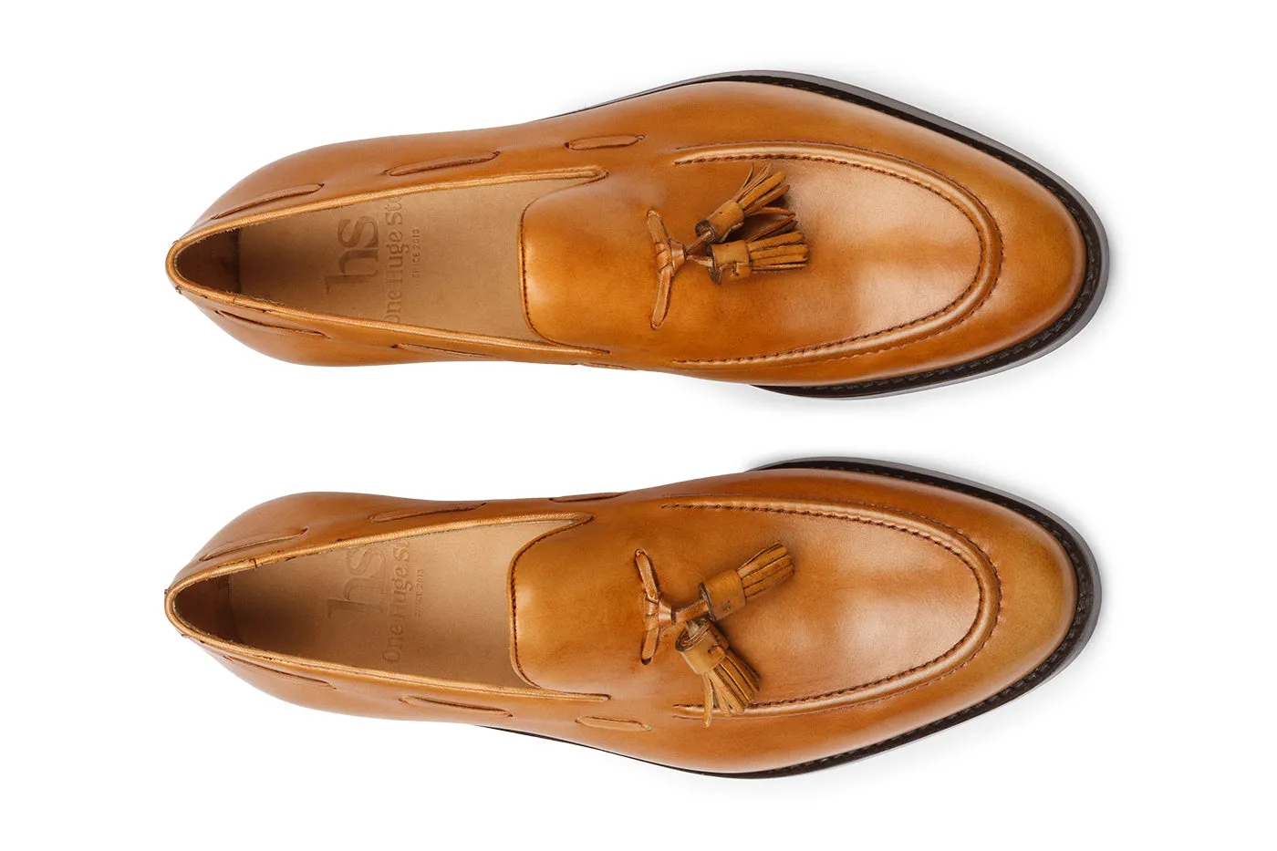 Tassel Loafer with cording stitch on the vamp and ornamental side lacing